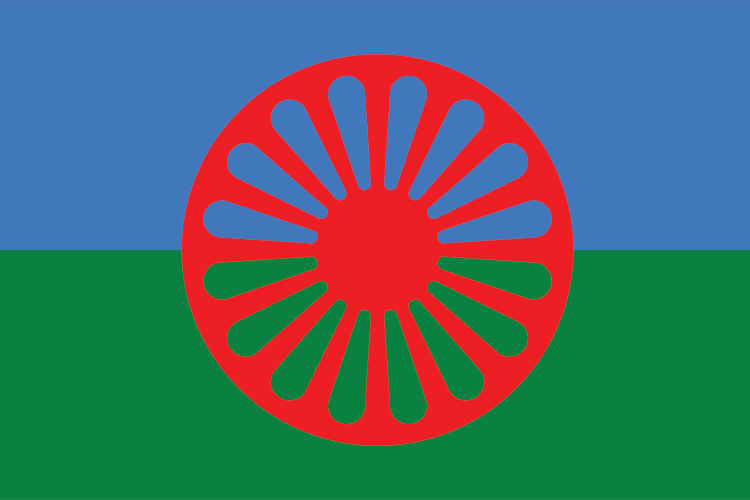 Ein rotes Rad auf blau-grüner Fahne